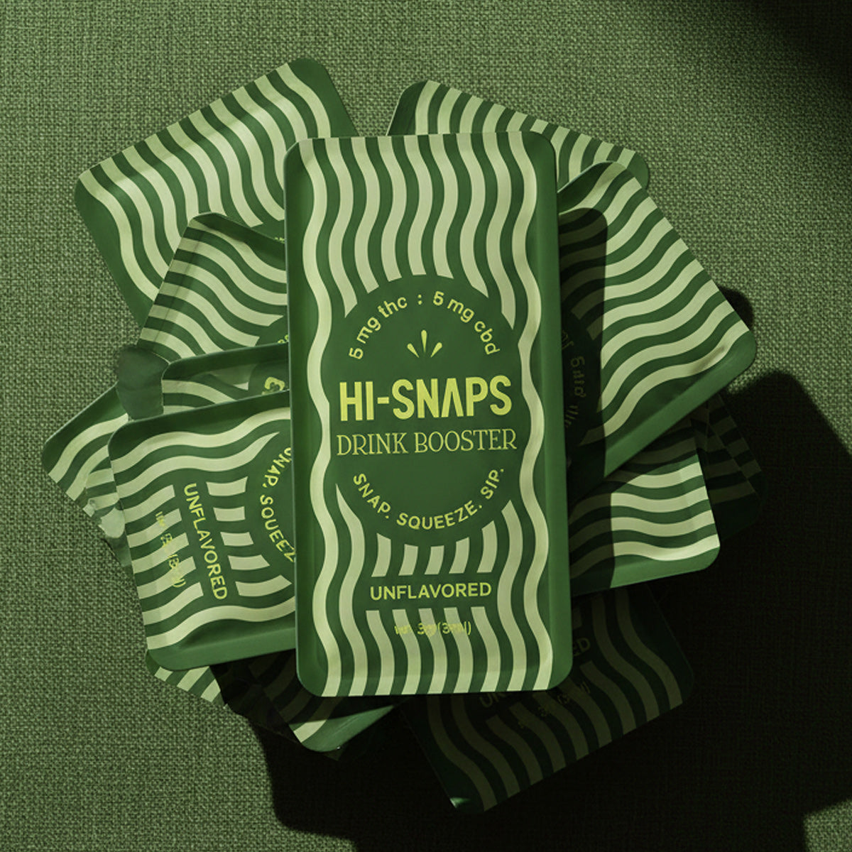 Hi-Snaps unflavored drink booster snap packets.